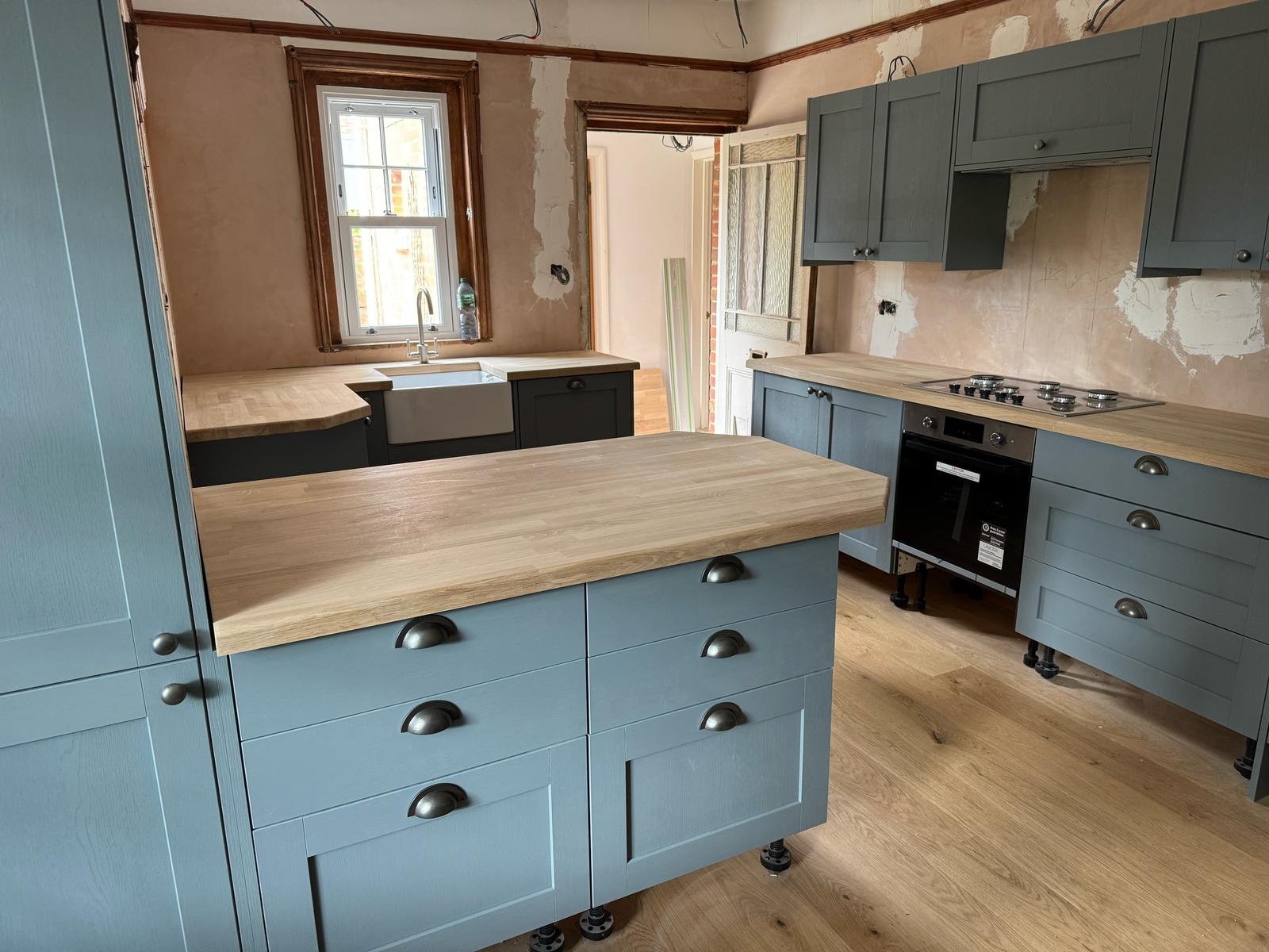 Kitchen island with drawers and oak work surface
